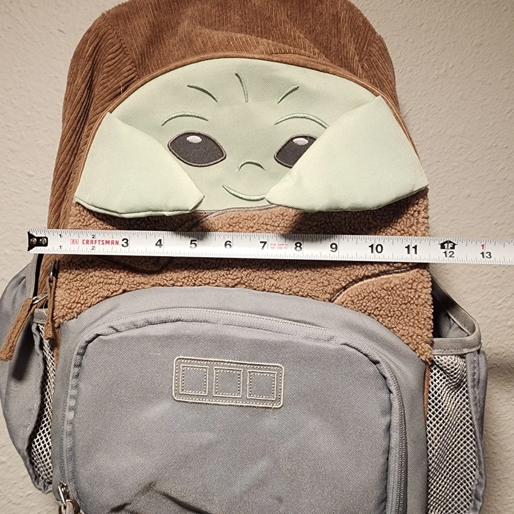 Brown and Gray Backpack with Character Design